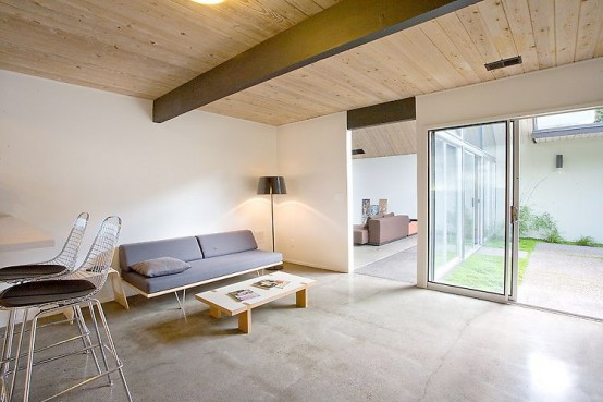 House Wraped Around The Open Atrium With High Double Gables
