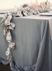 a seashell table runner will highlight a coastal tablescape or a beach-inspired one
