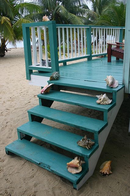 simply place large seashells on the steps inside or outside the house to make it feel more beachside like