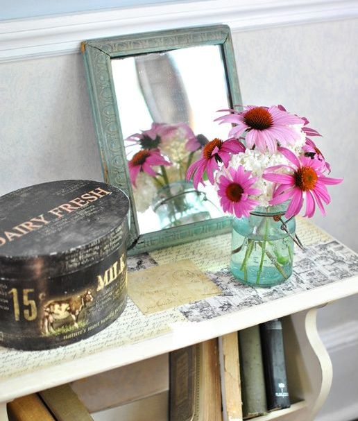 a simple jar with white and pink blooms is a nice solution for decorating any room and any space you want