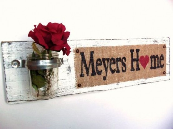 a shabby chic sign with a burlap touch, a jar with a red rose is a nice decoration for any space with a vintage or rustic feel