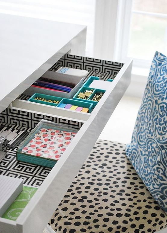 even the sleekest desk can host some drawers that will accommodate some office stuff - pens, pencils and so on