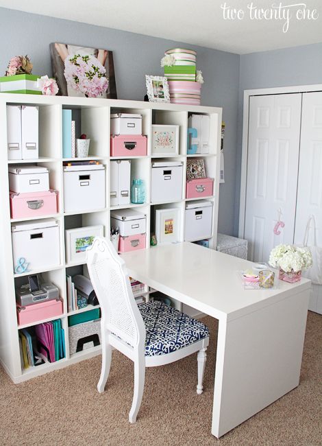 an IKEA Expedit shelving unit finished with large boxes or drawers is a great storage piece that will store everything you may need