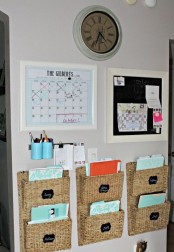 mini baskets attached to the wall may be used to store files, documents and other stuff you want
