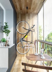 a special vertical wall bike holder is a great idea to store your bike when not in need, and it can be placed in a very small nook