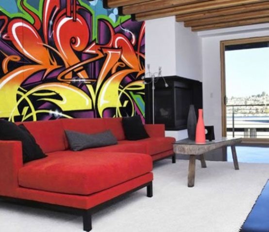 a neutral contemporary living room with a built-in corner fireplace and a super bold graffiti over the sofa for accenting the space and making it bolder
