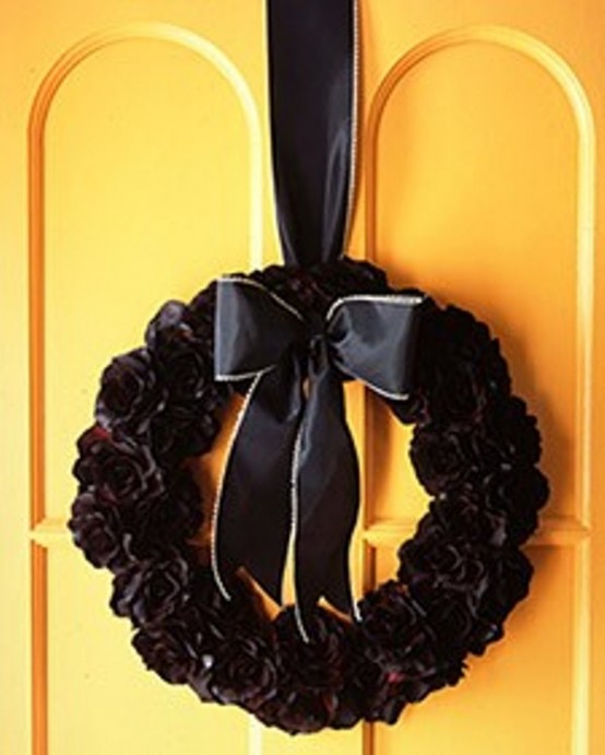 Ideas For Elegant Black And White Halloween If your front door is bright and colorful then completely black wreath would look truly gorgeous on it.