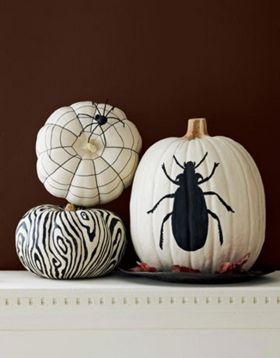 Ideas For Elegant Black And White Halloween If you can't find white pumpkins, paint orange ones with several coats of white latex paint. Next, using a paint pen you can freehand-paint or stencil simple black designs on them.