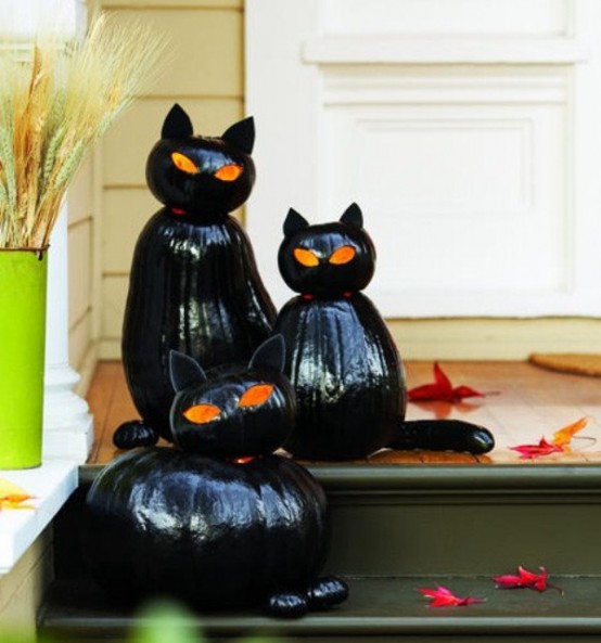 Ideas For Elegant Black And White Halloween Guests and costumed kids will ascend the stairs with trepidation, unsure if they will get a trick or a treat if you decorate your porch with such creepy black cats.
