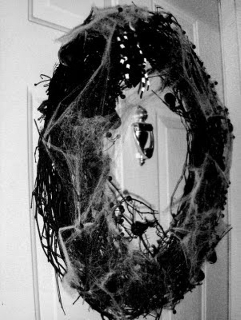Ideas For Elegant Black And White Halloween Decorating your front door with a wreath is the first thing you should think about before starting decorating your porch and yard.