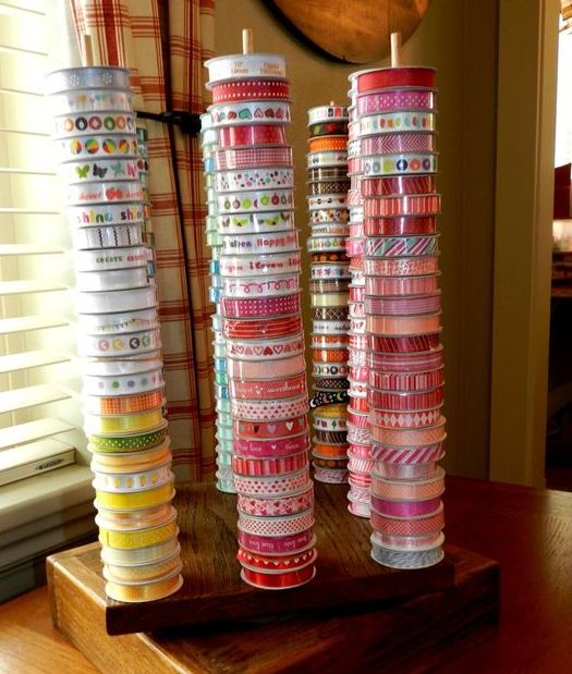 stands with colorful tape spools will help you have them all at hand