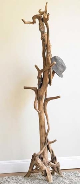 a driftwood clothes rack for a beachy or coastal entryway