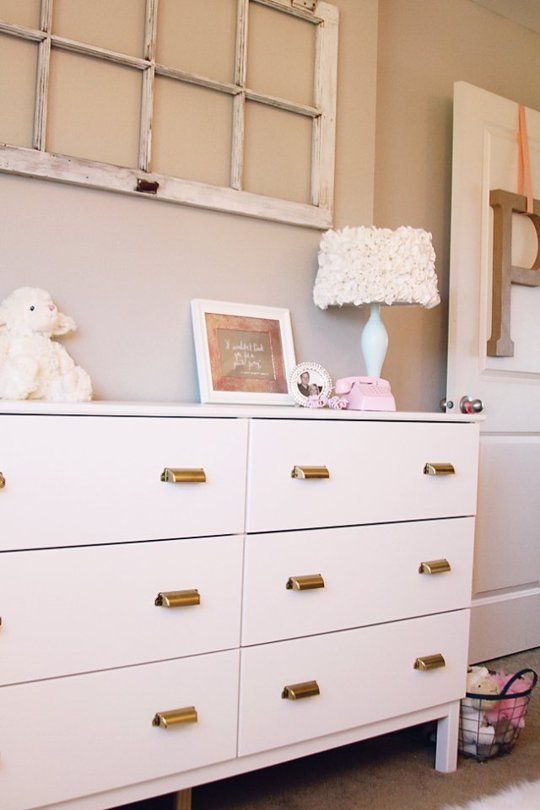 a white Tarva hack with vintage metal knobs is a stylish idea with a touch of retro
