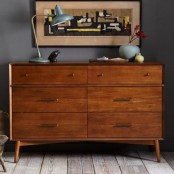 a rich stained Tarva hack with knobs and handles on legs is ideal for a mid-century modern wedding