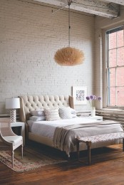a cute girlish bedroom with a vintage feel features a white brick statement wall that adds a harsh and edgy touch to the area