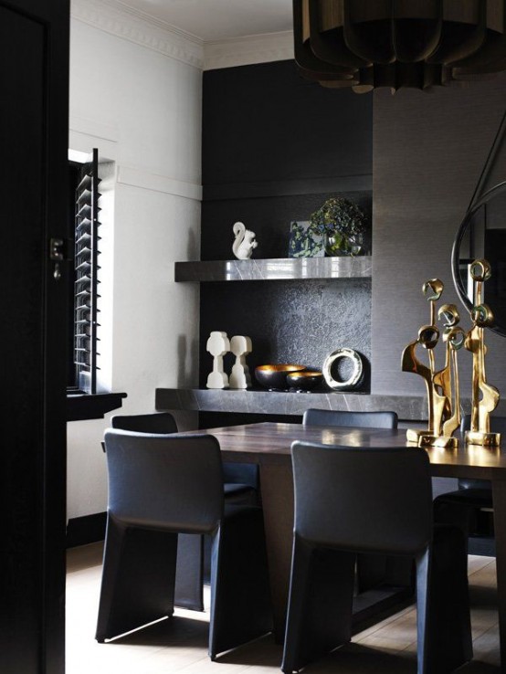 Impressive Black Interior Design With Gold And Orange Accents