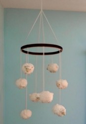a fun and cool sheep mobile will be a nice idea for any nursery and your kid will be able to count sheep easily