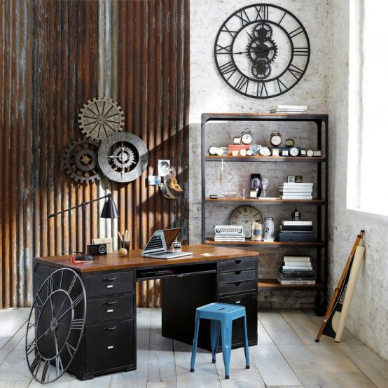 an industrial home office with white brick walls, wooden slabs on the wall, a vintage black metal and wood desk and a blue stool