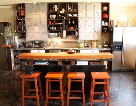 An unusual locker-style upper-cabinets is a focal point of this kitchen.