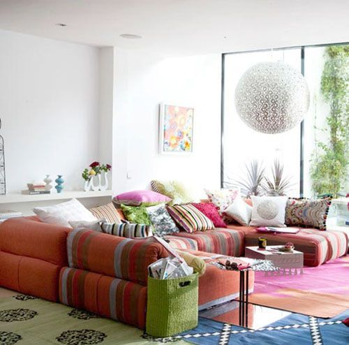 Inspiring Bohemain Living Room Designs Spacious sofa with lots of throw pillows in colorful patterns is the first thing you should consider designing a boho lounge area.