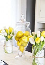 bright yellow tulips and yellow lemons in a jar are an easy and cool way to refresh your kitchen for spring