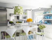 green botanical print chairs, a lamp and yellow blooms make the kitchen refreshed and bold