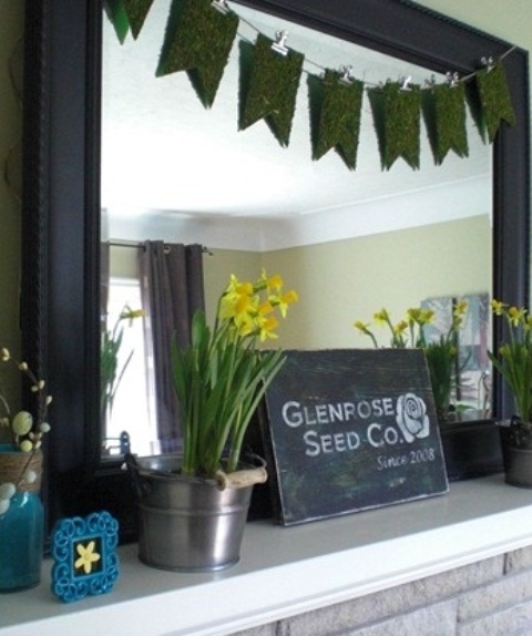 blooming daffodils, a moss bunting and a chalkboard sign