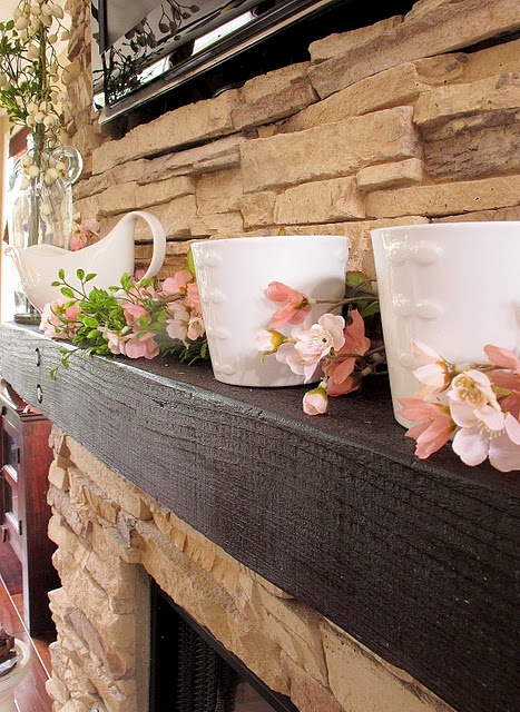 faux pink cherry blossom and jugs for a vintage spring mantel