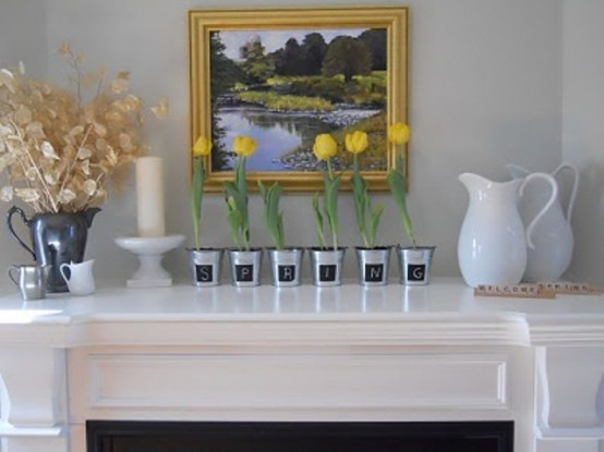 yellow tulips in chalkboard marked buckets is a cute idea for spring