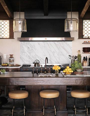 Natural wood is one of the best materials for a kitchen island. Just don't forget to add a durable countertop. 