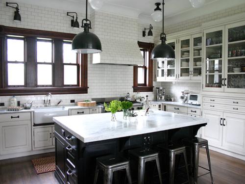 Black and white kitchen isles could work as in modern as in timeless kitchen designs.