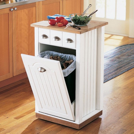 This is how smart kitchen islands could be. This one could serve as a cooking  board and have a trash bin inside it. Great for peeling and cutting vegetables!