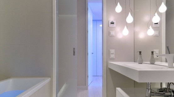 Lively Minimalist Apartment Design With Orange Accents