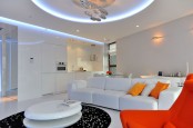Lively Minimalist Apartment Design With Orange Accents
