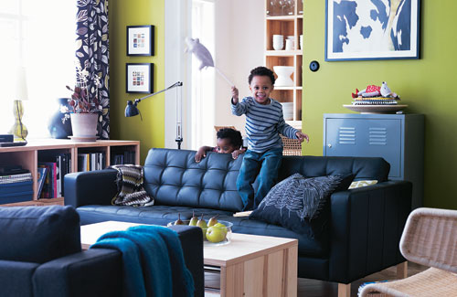 Living Room With Colorful Walls And Black Furniture