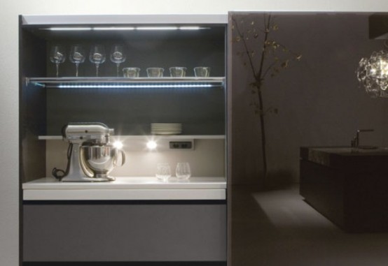 Luxurious Kitchen Of Dark Wood And Emperor Marble