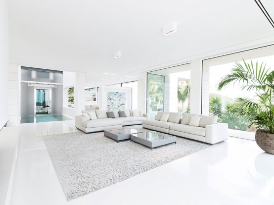 Luxury Villa Chameleon With A Glossy White Interior