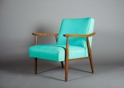 a bright mid-century modern chair with staind armrests and legs and bold turquoise upholstery is a cool idea with much color to add to your living room