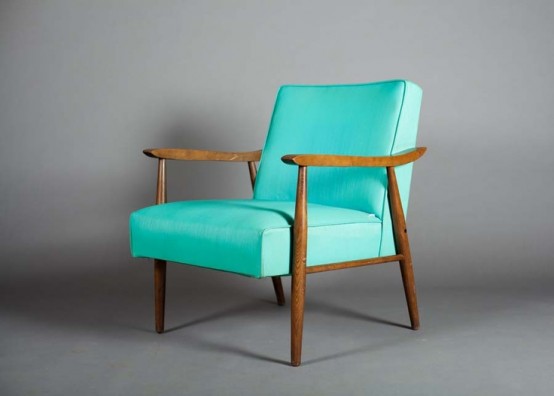 a bright mid-century modern chair with staind armrests and legs and bold turquoise upholstery is a cool idea with much color to add to your living room