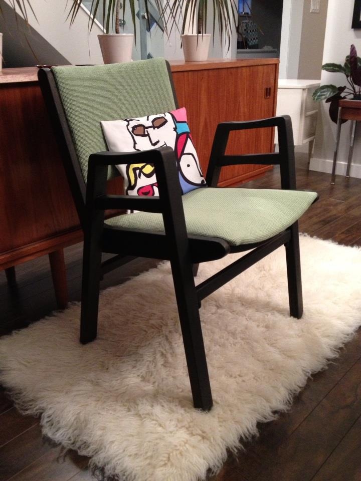 a comfy and stylish mid century modern chair with a dark stained frame and legs and green upholstery is a cool idea