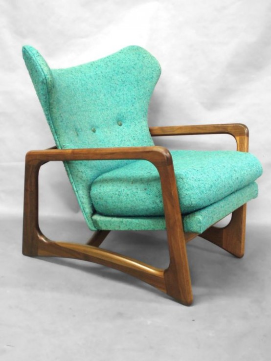 a catchy and bold mid-century modern chair with a stained frame plus bold turquoise upholstery is amazing for a modern space