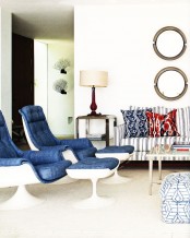 comfortable navy and white chairs with denim upholstery and matching footrests are amazing and will add an informal touch