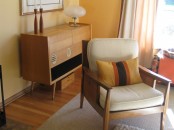 a beautiful neutral chair with a light-stained frame and legs and neutral upholstery is a cool and chic idea for a modern space