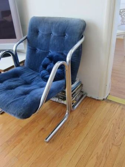 a bold chair with a catchy and durable metal frame, with gorgeous blue upholstery is a stylish and catchy idea