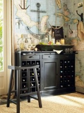 an elegant vintage bar of dark wood with open and closed storage compartments and a bar stool for a vintage feel