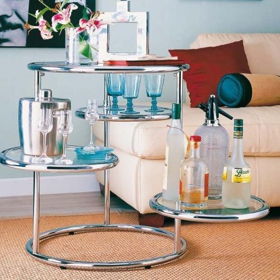 a whimsy home bar with a creative coffee table - parts of it on several levels is a veyr creative idea