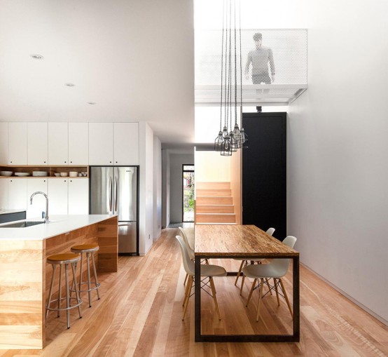 Minimal Black And White Kitchen With A White Brick Wall