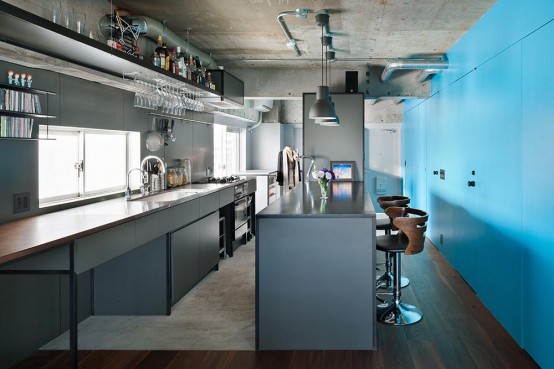 Minimalist And Industrial Apartment With Turquoise Accents