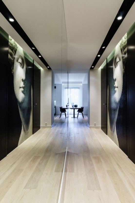 Minimalist Apartment With Creative Storage And Graphic Decor