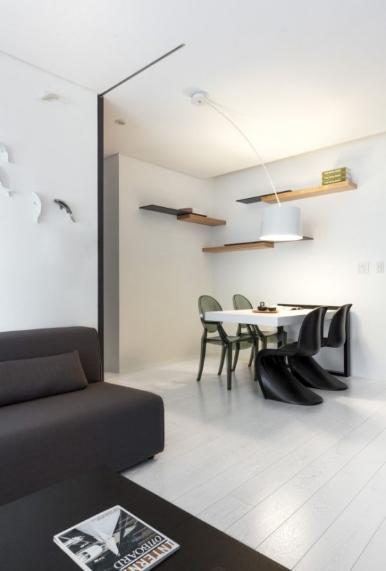 Minimalist Black And White Apartment With Colorful Touches